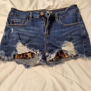 Kancan distressed shorts with leopard pockets